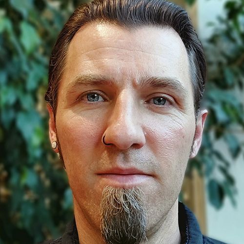 Ein Portraitfoto eines Mannes